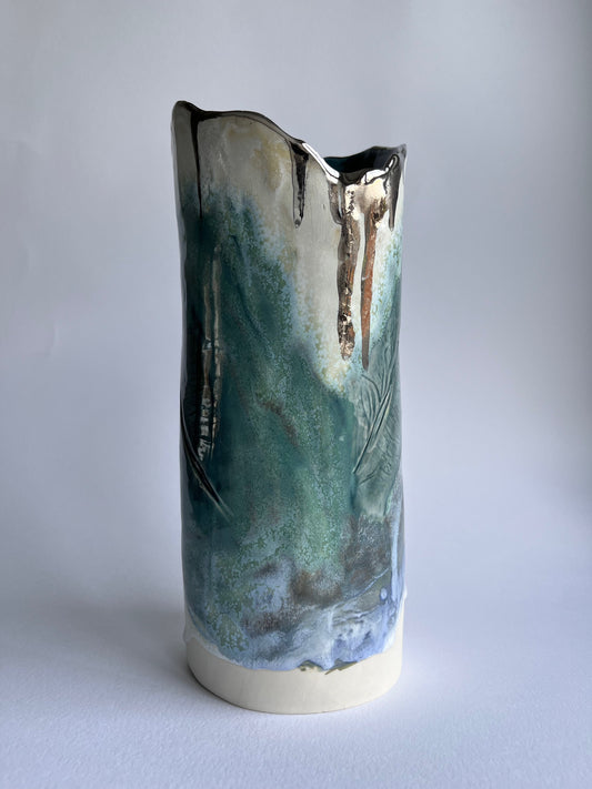 Statement Feather vase in layered blue/green/cream  glazes
House Renovators and  Interior designers