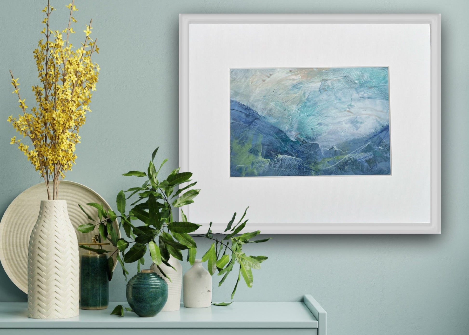 Atmospheric painting of clouds through the valley painted by Nicola Briggs in a card mount 10 x 12 "