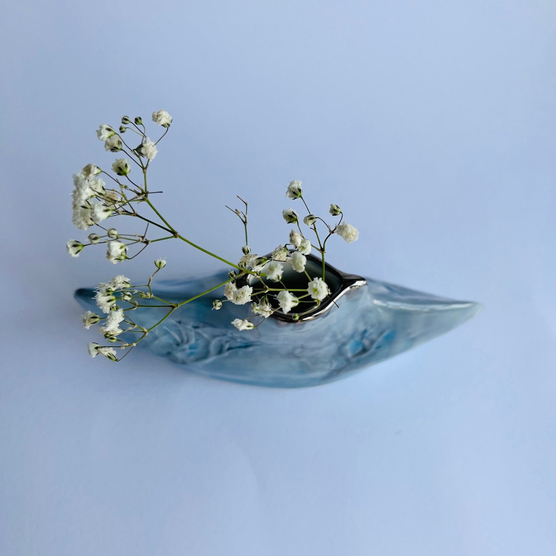 Blue and Grey Silhouette Winter Trees Porcelain Bottle Vase from above with gypsophila by Nicola Briggs Ceramics 