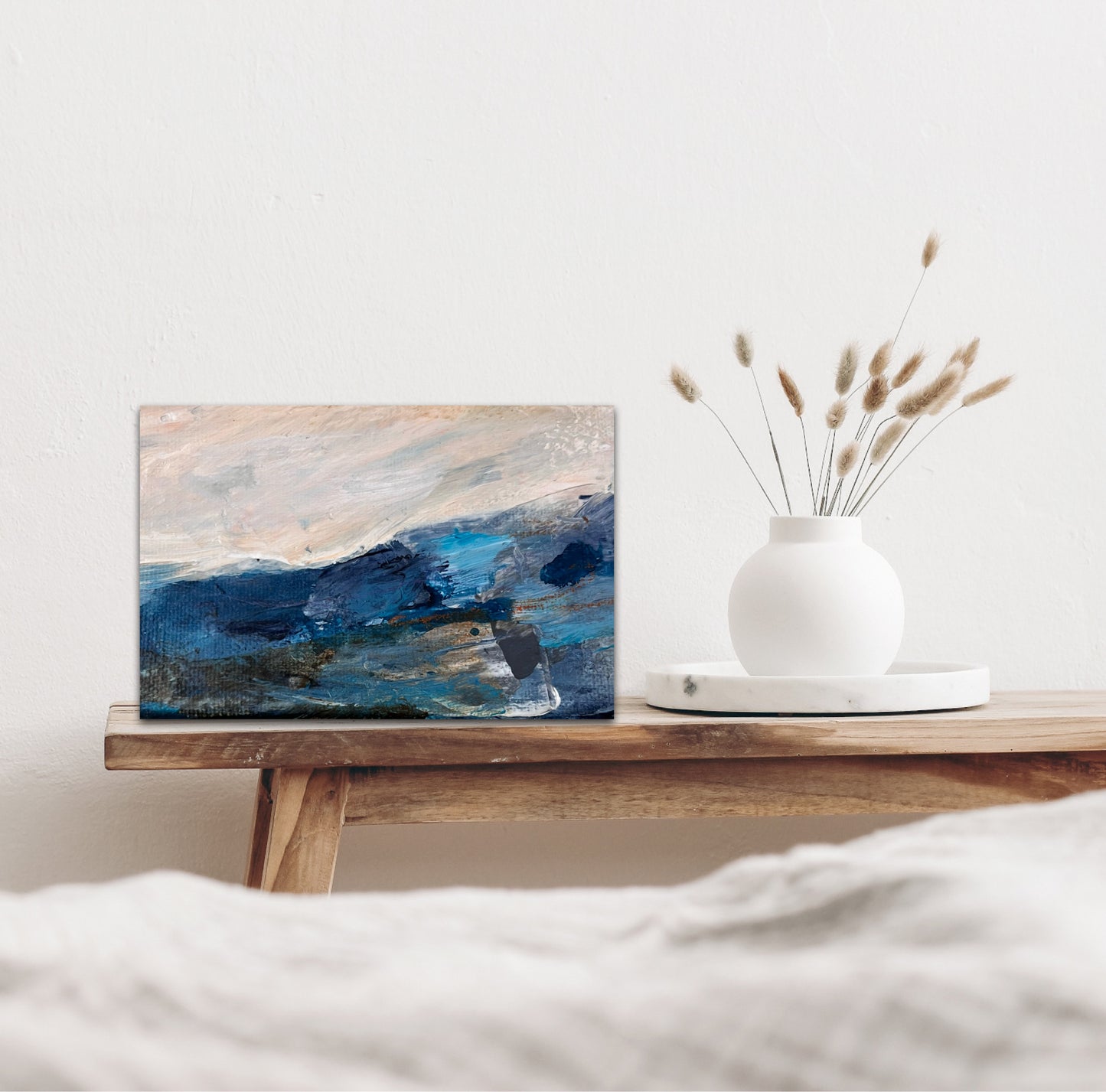 Fragments of Calm II small atmospheric original landscape painting on box canvas by Nicola Briggs lifestyle photo on rustic wooden console table 