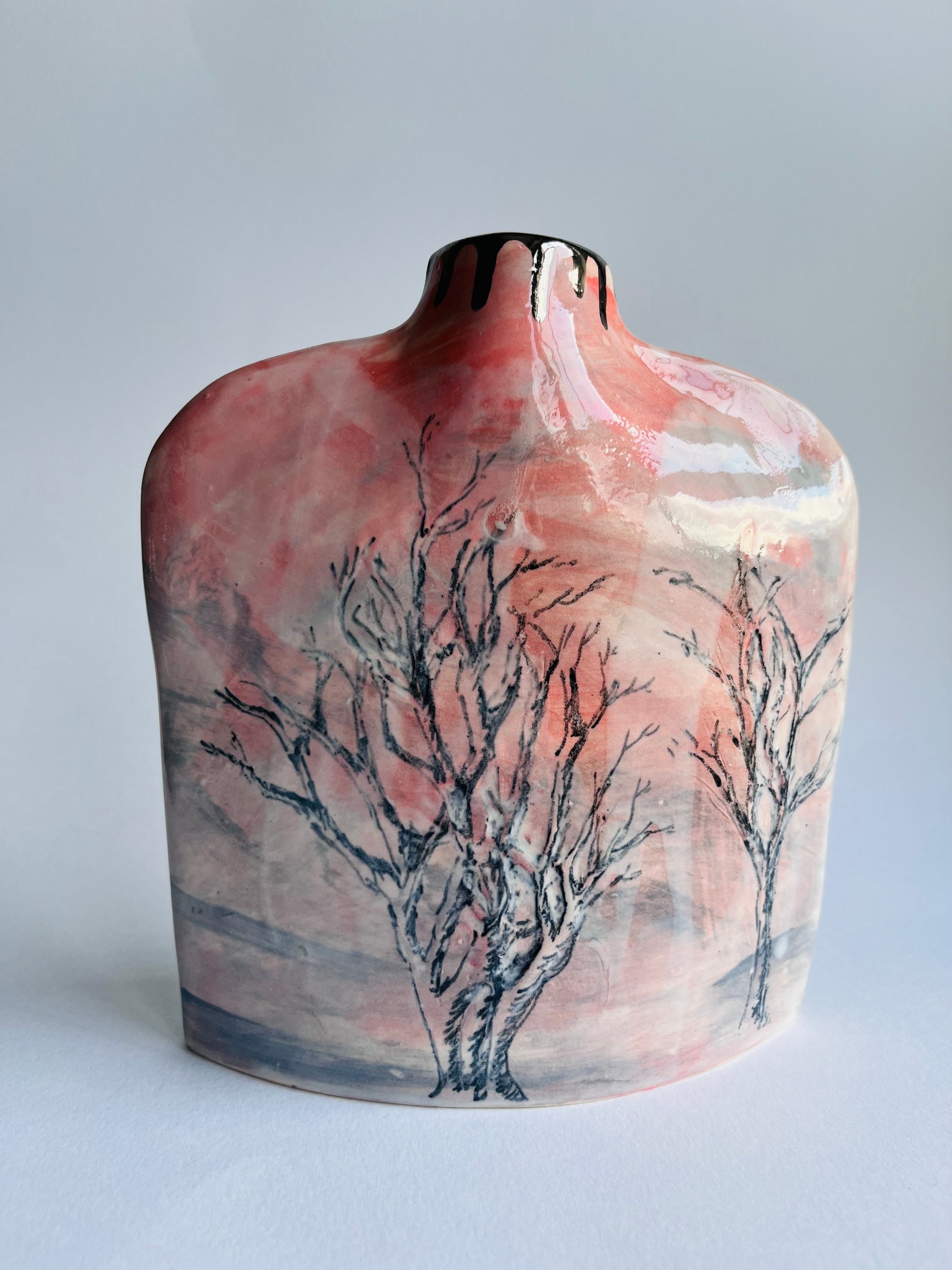 Pink Ceramic vase with tree design on a plain background by Nicola Briggs Ceramics 