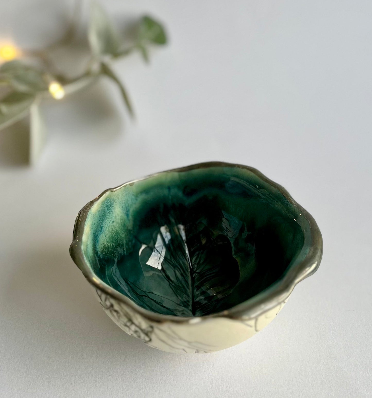 Green glazed feather bowl in high fired porcelain with real platinum rim